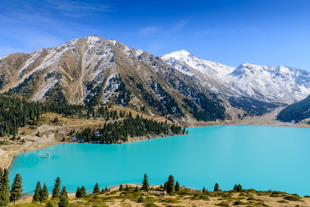 Big Almaty Lake surrounded by mountain peaks